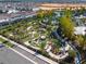 Aerial view showcasing a community's amenities, including a mini golf course, pool, and water slide at 4361 Lana Ave, Davenport, FL 33897