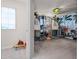 ' bedroom featuring triple bunk beds and a whimsical jungle-themed wall design at 4361 Lana Ave, Davenport, FL 33897