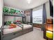 Themed bedroom with custom bunkbeds, unique Minecraft decor, and a playful design ideal for  at 4361 Lana Ave, Davenport, FL 33897