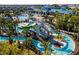 A water park complete with a lazy river and slide, surrounded by palm trees at 4361 Lana Ave, Davenport, FL 33897