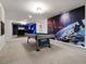 The game room features a pool table and Star Wars wall decor, perfect for entertainment and Gathering fun at 4361 Lana Ave, Davenport, FL 33897