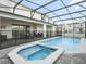Enjoy the outdoor pool and spa, with a screened-in lanai and backyard, perfect for relaxing and entertaining at 4361 Lana Ave, Davenport, FL 33897