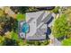 Aerial image showcasing a backyard pool with a screened lanai and patio, manicured lawn, and mature landscaping at 703 Cricklewood Ter, Lake Mary, FL 32746