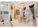 Formal dining room with stylish decor, chandelier lighting, and neutral color palette at 703 Cricklewood Ter, Lake Mary, FL 32746