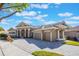 Charming single-story home with a manicured lawn, mature trees and paver driveway at 703 Cricklewood Ter, Lake Mary, FL 32746