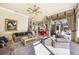 Open living area with access to the outdoor pool and kitchen and dining spaces at 703 Cricklewood Ter, Lake Mary, FL 32746