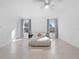 Bright bedroom with a minimalist design and neutral tones at 7108 Stockholm Way, Orlando, FL 32822
