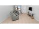 Inviting living room showcasing tile flooring, neutral walls, and comfortable seating near a bright window at 7108 Stockholm Way, Orlando, FL 32822