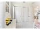 Bedroom featuring double closets, a large dresser, neutral carpet, and lots of natural light at 8006 Hoylake Dr, Orlando, FL 32832