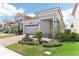 Charming single-Gathering home with a red brick driveway and well-manicured landscaping at 8006 Hoylake Dr, Orlando, FL 32832