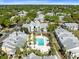 Aerial view of the community showcasing the pool and lush landscaping at 1017 S Hiawassee Rd # 3718, Orlando, FL 32835