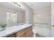 Bathroom featuring a tub and shower combination, a vanity, and neutral-toned finishes for a clean look at 1017 S Hiawassee Rd # 3718, Orlando, FL 32835