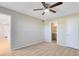 Well-lit bedroom includes carpeted floors and access to a private bathroom for enhanced comfort and privacy at 1017 S Hiawassee Rd # 3718, Orlando, FL 32835