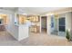 Light-filled living room blending seamlessly into the kitchen with a sliding door leading to the outdoor space at 1017 S Hiawassee Rd # 3718, Orlando, FL 32835