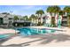 Sparkling community pool with lounge chairs offers a resort-style living experience at 1017 S Hiawassee Rd # 3718, Orlando, FL 32835