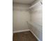 Walk-in closet featuring neutral walls and wire shelving at 120 S Chandler Ave, Deland, FL 32724