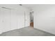 Bright bedroom with closet and carpeted floors, offering a cozy and inviting space at 13405 Sw 88Th Ter # 53, Ocala, FL 34473