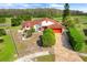 Aerial view of a house featuring a large yard and scenic landscape at 13542 Texas Woods Cir, Orlando, FL 32824