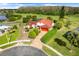 Bird's eye view of home showing scenic landscaping and adjacent water features at 13542 Texas Woods Cir, Orlando, FL 32824