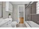 Well-lit bathroom featuring a tiled shower/tub, toilet, and sink with modern vanity at 1407 Lantry Ct, Orlando, FL 32804