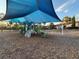 Shaded community playground with slides, swings, and a picnic area, ideal for families at 14675 Scott Key Dr, Winter Garden, FL 34787