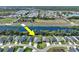 Overhead shot of community on river near highway with convenient access to shopping and recreational activities at 149 St Thomas Dr, Mulberry, FL 33860