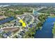 Bird's eye view of property located on the river in well-planned community with manicured landscaping at 149 St Thomas Dr, Mulberry, FL 33860