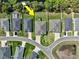 Overhead shot of backyard pool, fenced property, and manicured lawn in a well-planned neighborhood at 149 St Thomas Dr, Mulberry, FL 33860