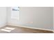 Bright bedroom with hardwood floors and natural light, creating a comfortable space at 149 St Thomas Dr, Mulberry, FL 33860