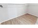 Empty walk-in closet features ample storage and vinyl floors at 149 St Thomas Dr, Mulberry, FL 33860