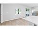 Bright kitchen with stainless steel appliances and breakfast bar visible from bedroom at 149 St Thomas Dr, Mulberry, FL 33860