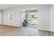 Spacious living room with sliding glass doors leading to the patio at 149 St Thomas Dr, Mulberry, FL 33860