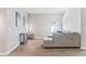 Spacious living room with modern decor, wood floors, and plenty of natural light at 149 St Thomas Dr, Mulberry, FL 33860