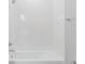 Spotless, all-white tiled shower and tub combination at 149 St Thomas Dr, Mulberry, FL 33860