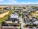Beautiful aerial view of a residential community with manicured lawns and a well-maintained golf course at 1523 Corolla Ct, Reunion, FL 34747
