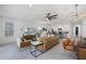 Open floor plan featuring a combined living, dining, and kitchen area, perfect for gatherings at 1523 Corolla Ct, Reunion, FL 34747