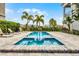 Stunning backyard swimming pool with a hot tub and sun loungers at 1523 Corolla Ct, Reunion, FL 34747