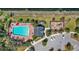 Overhead shot highlighting the community pool, playground, and surrounding green spaces at 15604 Starlite St, Clermont, FL 34714