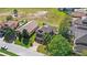 Overhead shot showcasing the home's landscaping and driveway, situated on a well-kept street at 15604 Starlite St, Clermont, FL 34714