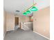 Open hallway space featuring gray carpet, neutral paint, and a stairway at 15604 Starlite St, Clermont, FL 34714