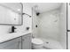 Stylish bathroom featuring modern fixtures, a marble-look shower and vanity at 1563 Immocalee St, Intercession City, FL 33848