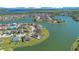 Gorgeous aerial view of the lake community showcasing waterfront homes and natural beauty at 1730 Boat Launch Rd, Kissimmee, FL 34746