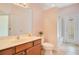 Bathroom with walk-in shower and vanity at 1730 Boat Launch Rd, Kissimmee, FL 34746