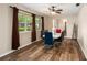 Dining room with modern lighting and window at 1800 Johnson Dr, Clermont, FL 34711