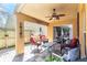 Inviting outdoor patio area with comfortable seating and decorative accents at 2109 Carpathian Dr, Apopka, FL 32712