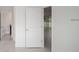 Bathroom doorway with toilet and sink visible at 2681 Sw 161St Loop, Ocala, FL 34473