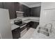 Modern kitchen featuring granite countertops and stainless steel appliances at 2681 Sw 161St Loop, Ocala, FL 34473