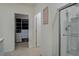 Bathroom featuring tile flooring, walk-in shower, and open access to a walk-in closet at 2736 Dumont Ln, Tavares, FL 32778