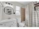 Well-maintained bathroom featuring updated vanity, lighting, and shower at 295 Garland St, Deltona, FL 32725