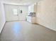 Clean unfinished basement with storage space and a sink, perfect for customization at 32803 Forest Ave, Leesburg, FL 34788